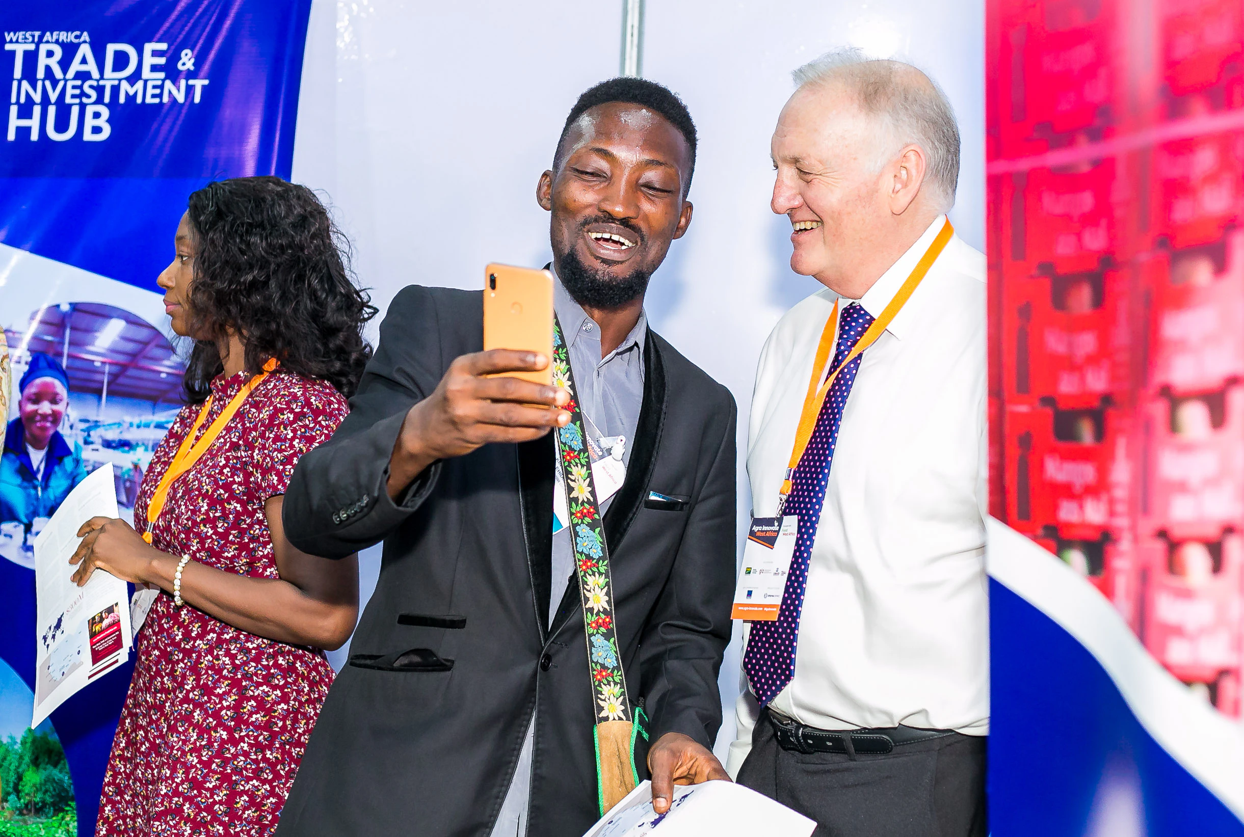 Agriculture industry professionals networking and capturing event highlights at Growtech West Africa exhibition.