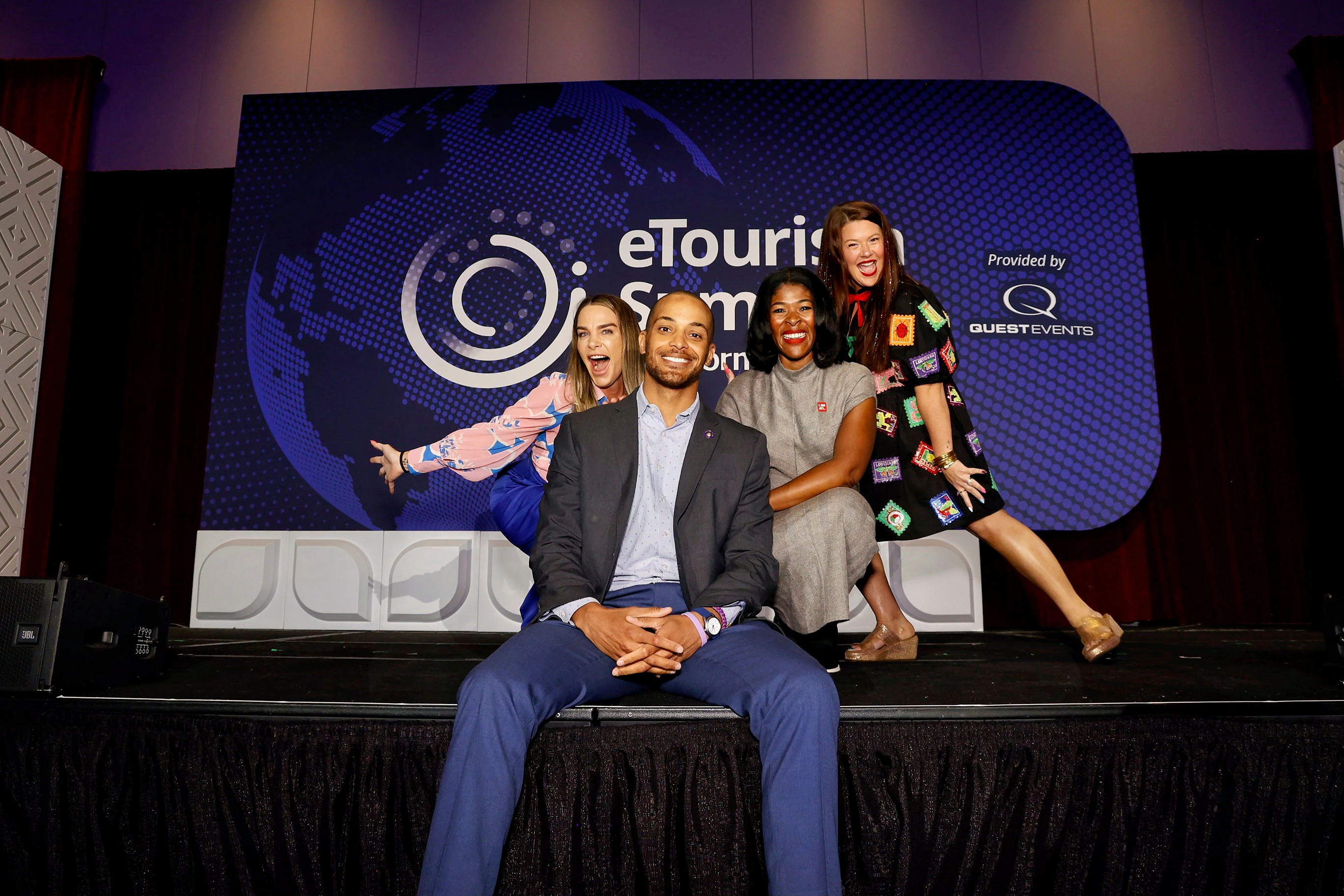 eTourism co-hosts on stage at eTourism Summit.