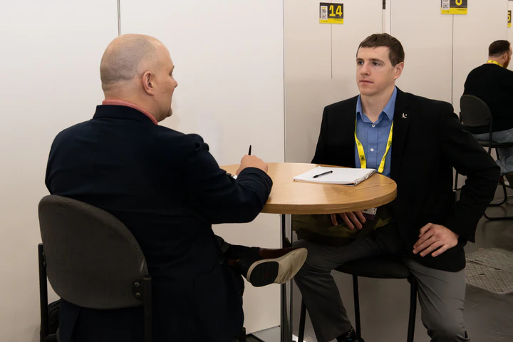 Meeting between three delegates at The AI Summit London