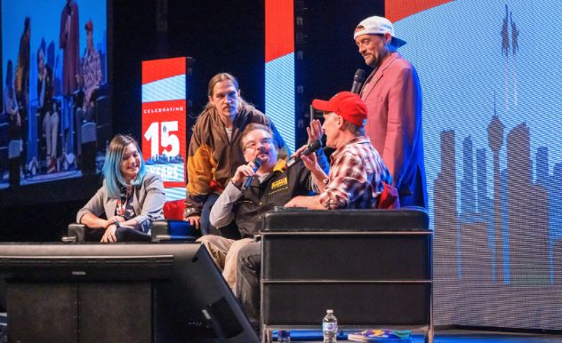 clerks cast talking on stage
