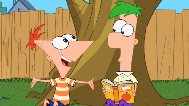 From left to right: Phineas Flynn sitting next to his brother Ferb Flynn (who is holding a book), all while saying his iconic catch-phrase, “Hey Ferb, I know what we’re gonna do today!”