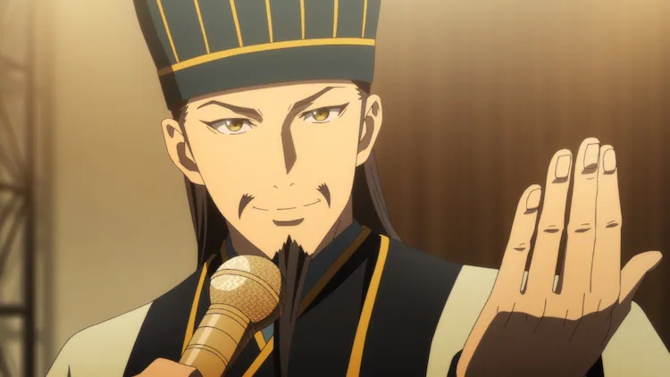 The eponymous progatonist of Ya Boy Kongming!, Zhuge Liang Kongming, using a microphone as he makes a gesture with his left hand.