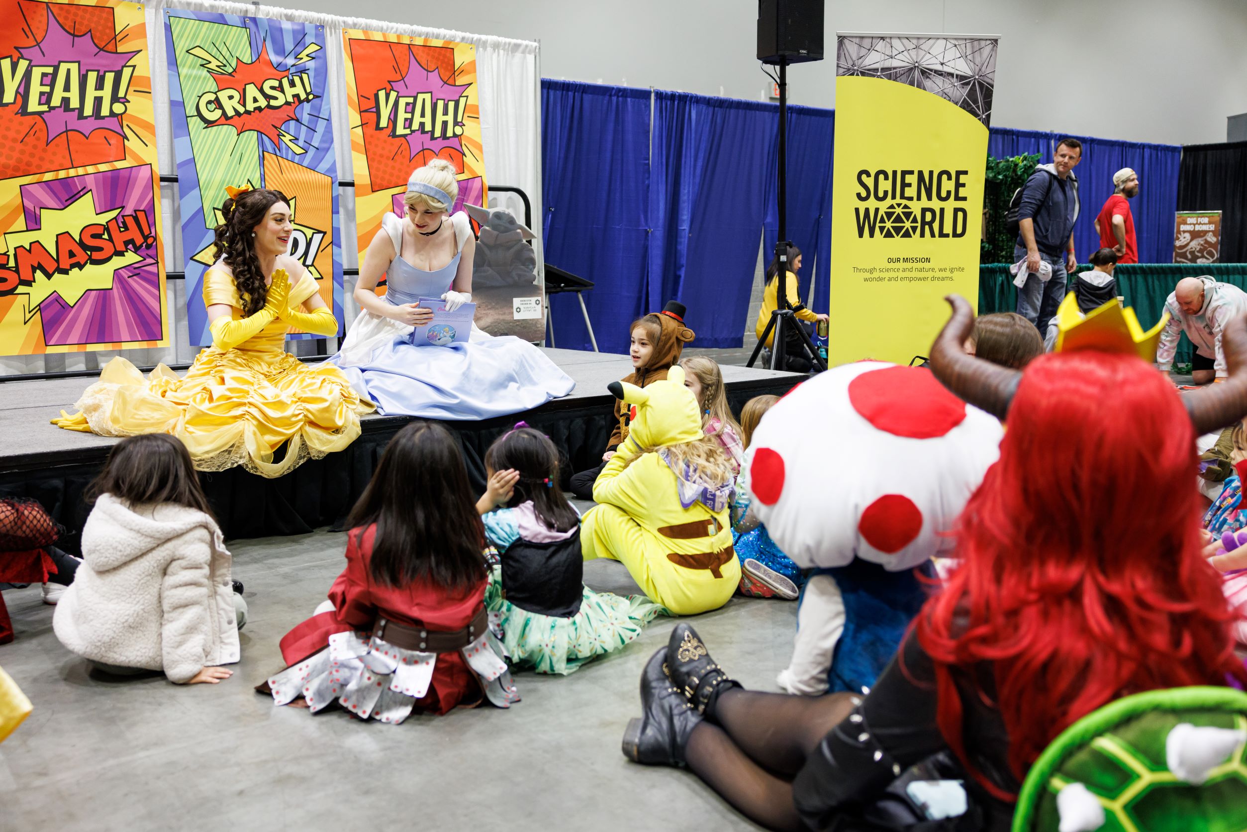 Princesses singing to children at the Community Zone