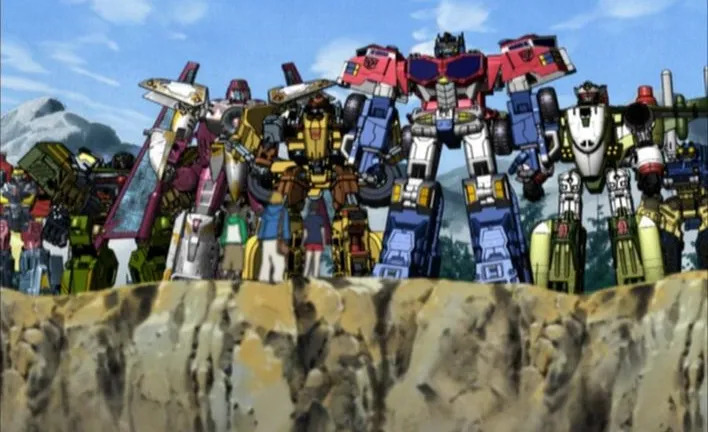 A shot of the Autobots featured in Transformers: Cybertron. From left to right: Hotshot, Overhaul, Vector Prime, Landmine, Optimus Prime, Jetfire, and Scattershot.