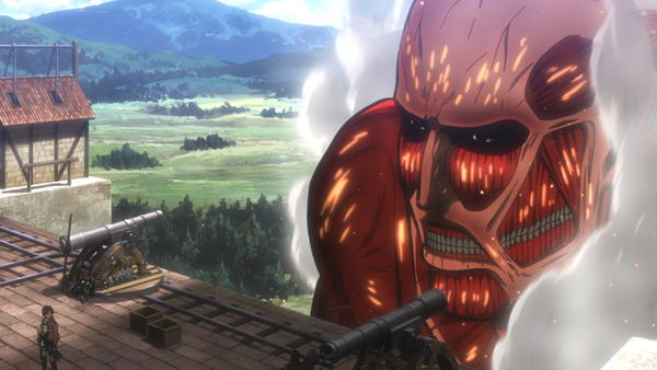 Eren Yaeger standing on top of one of the Walls, as the Colossal Titan makes its appearance known.