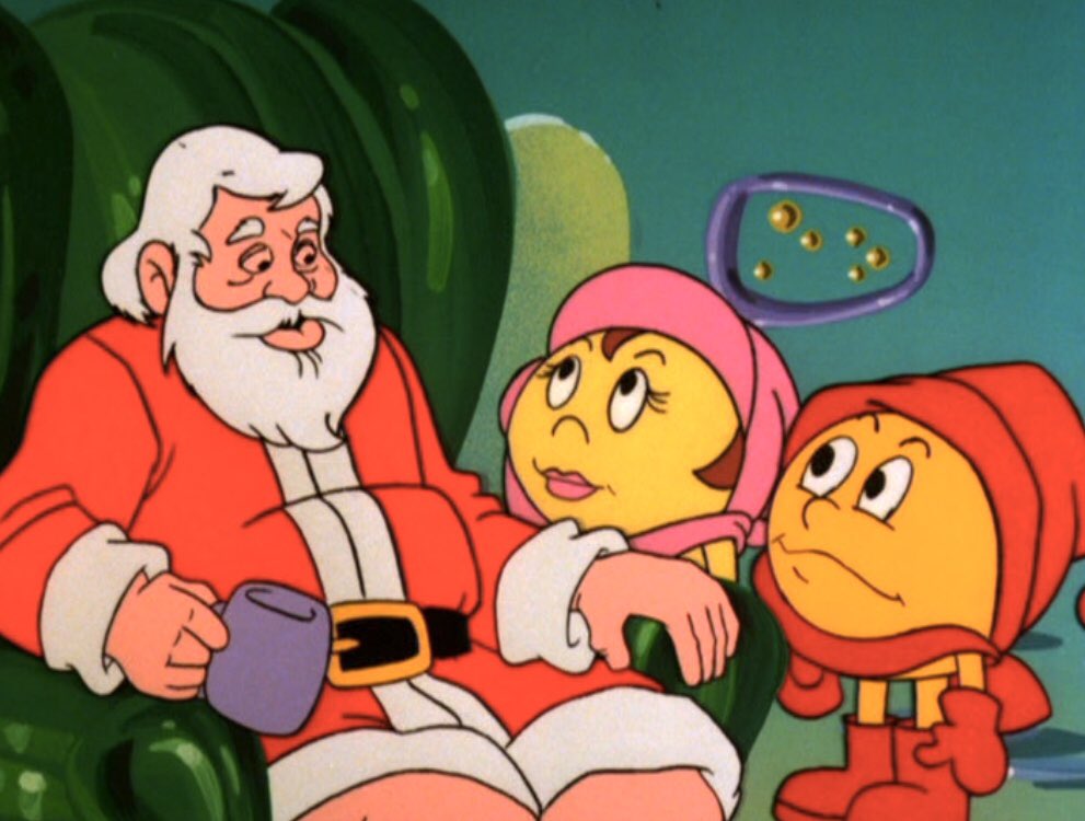 A still from the Christmas Comes to Pac-Land special. Here, Santa Claus speaks to Pac-Man and Ms. Pac-Man.