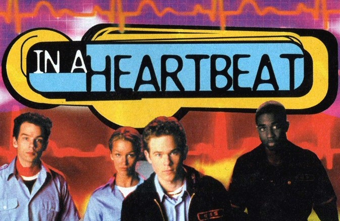 The main characters of "In a Heartbeat" all featured on a title card of the show. Left to right: Jamie Waite (Christopher Ralph), Val Lanier (Reagan Pasternak), Hank Beecham (Danso Gordon), and Tyler Connell (Shawn Ashmore).