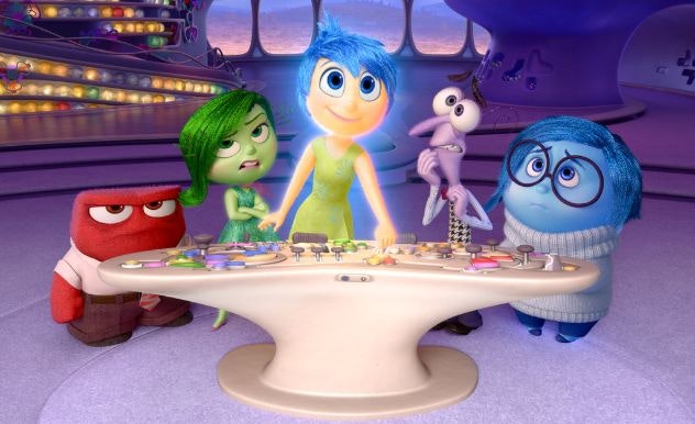 The emotions from Inside Out (L-R: Anger, Disgust, Joy, Fear, Sadness) stand at a console table