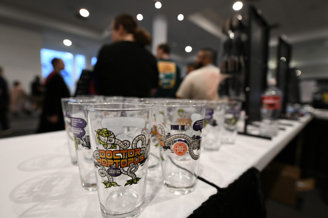 Our pint glass collaborations from previous years. Featured is Doctor Hoptopus, what has the Doctor Octopus tentacles holding hops on the front, and the FAN EXPO Denver and Breckenridge Brewery logos on the back