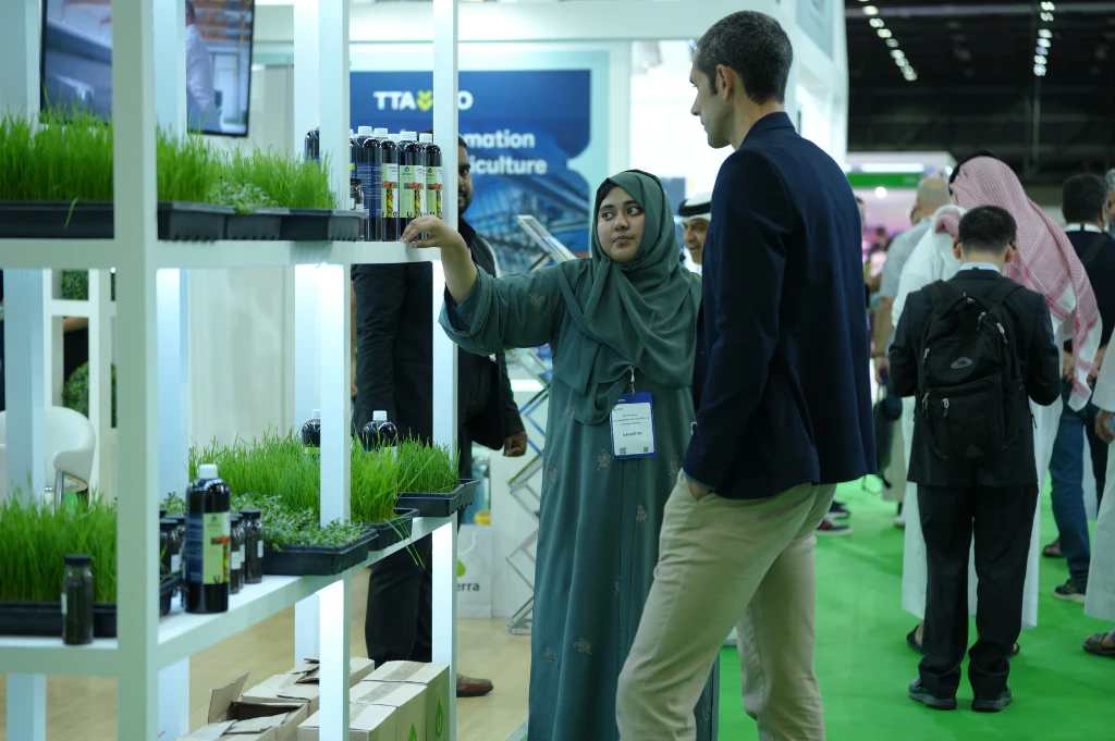 Government agriculture officials and agribusiness professionals exploring AgriTech innovations at Growtech Middle East