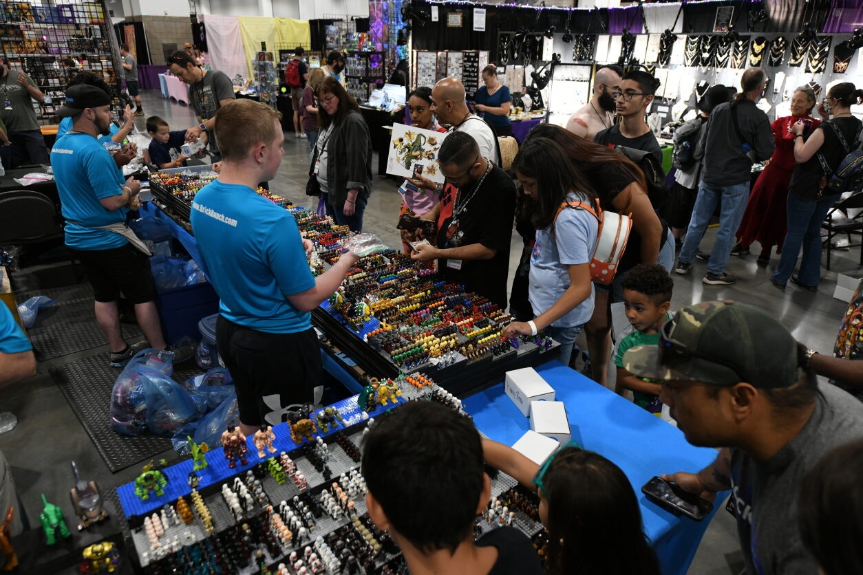 Fans browse the selection of lego mini figures