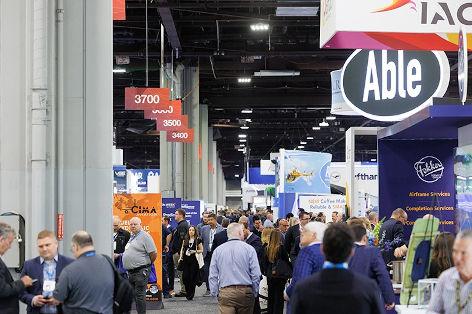 Exhibition hall aisle with visitors
