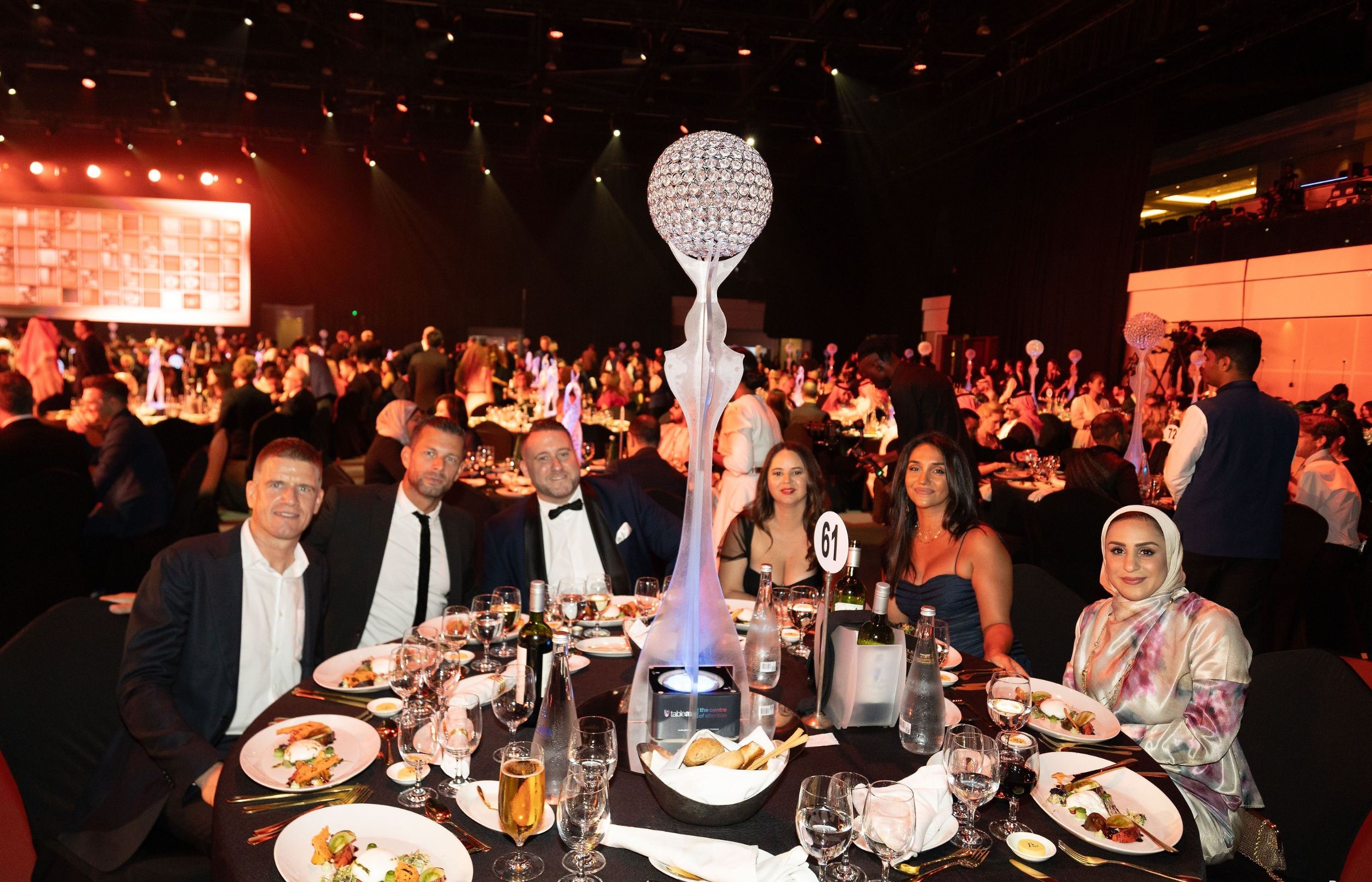 Middle East Event Awards gala dinner with industry professionals seated at a formal banquet table, celebrating excellence in live events, experiential marketing, and MICE across the Middle East.