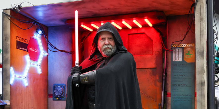 ONE OF OUR AMAZING COMMUNITY ZONE MEMBERS POSED IN FRONT OF ONE OF THEIR STAR WARS PHOTO OPS