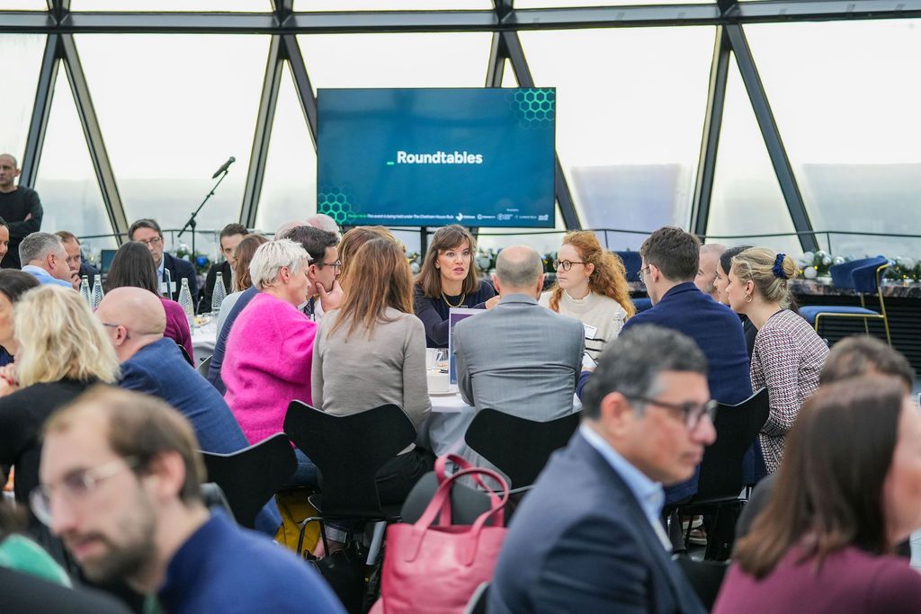 Group of people together in discussion