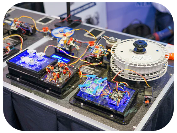 A tabletop filled with assorted electronic devices