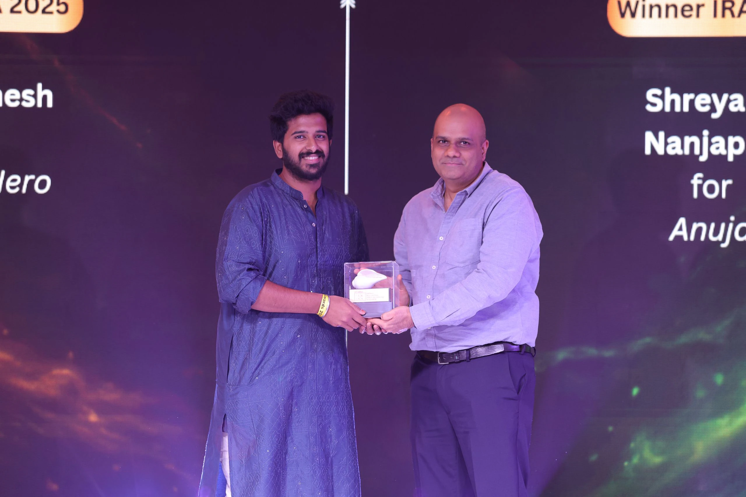 IRAA 2025 – Sukumar Nallagonda collects the award for Sound Designer for Short Films on behalf of Jai Ganesh