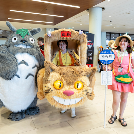 Studio Ghibli cosplayers are dressed from My Neighbour Totoro. Left to right: Totoro, Cat Bus, Bus Stop