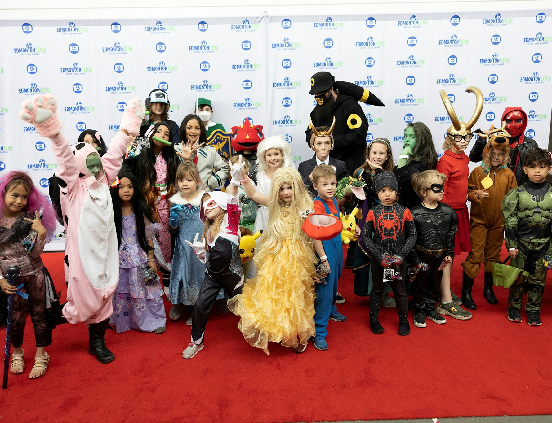 Bunch of children in cosplay on the Red Carpet