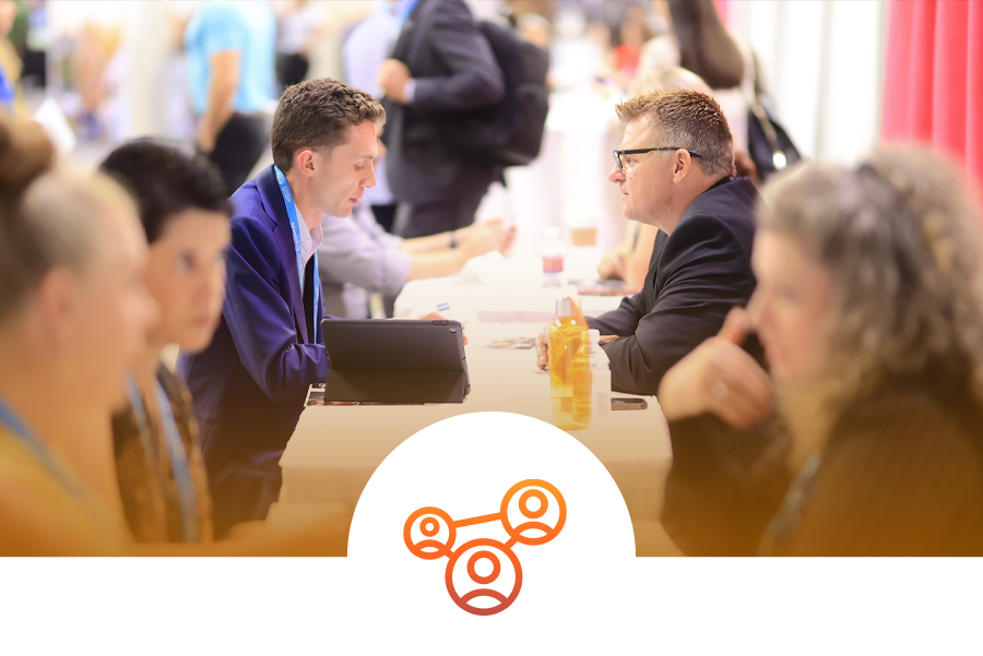 Two men taking marketplace appointments at a Connect event.