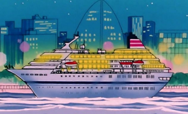 a large cruise ship outside a city port