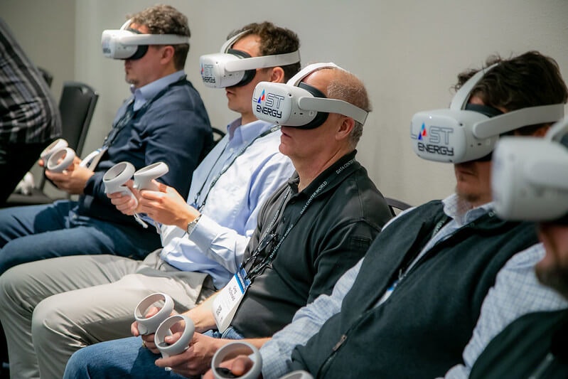 Data Center World 2022 attendees demoing AR/VR