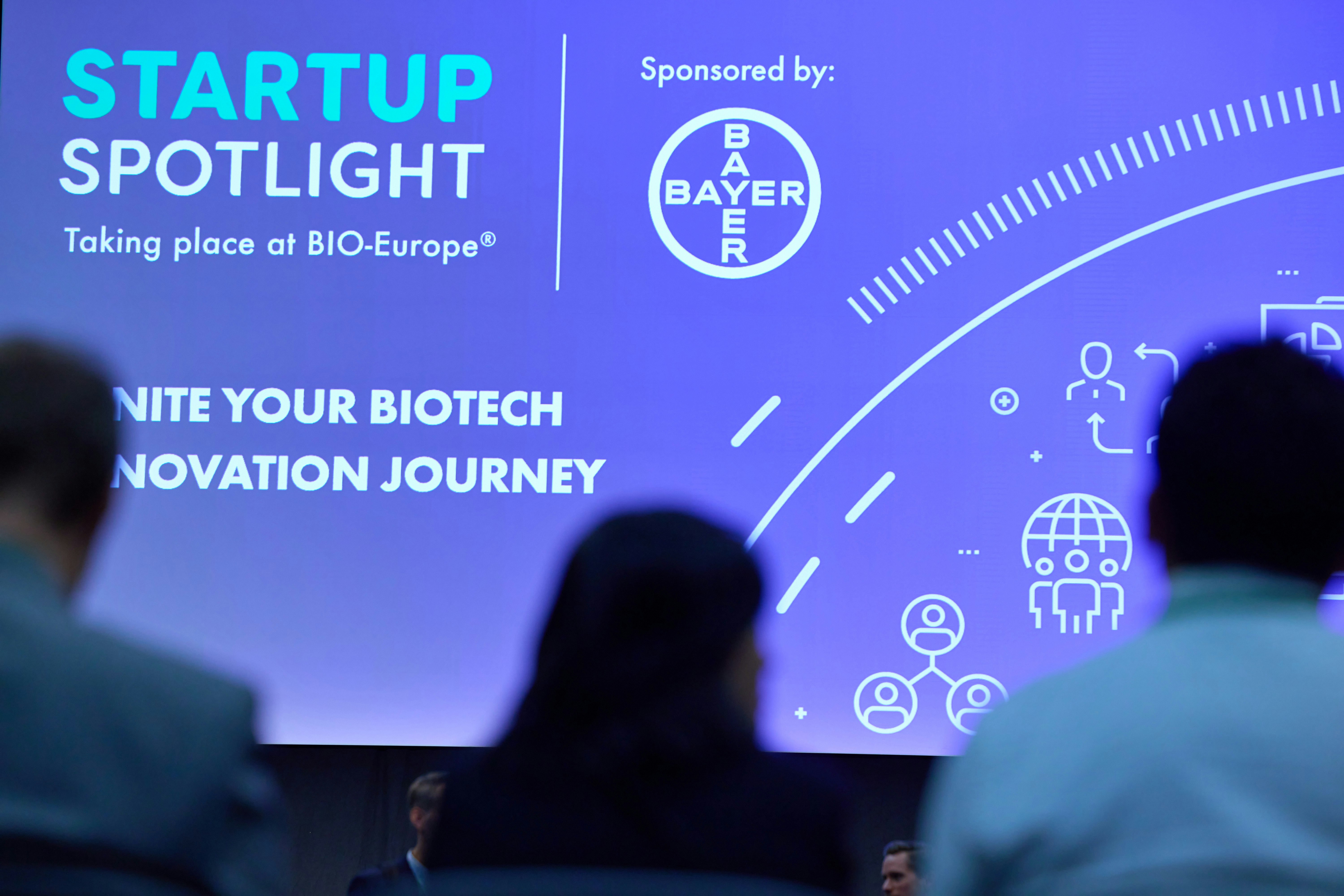 A crowd looking at a presentation