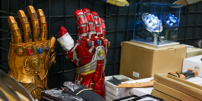 Picture display goods for sale. Goods include replica gloves of famous superhero movies such as the Marvel Avengers