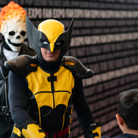 Wolverine is staring down the camera with Ghostrider behind him