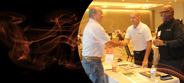 Attendees shaking hands during a meeting at Tobacco+ Forum.