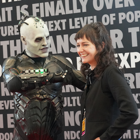 Fans in cosplay interacting