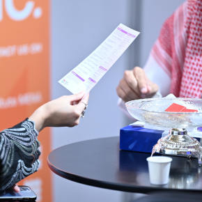 Visitors exploring brochures and networking opportunities at Saudi Intermobility Expo 2025 in Riyadh.