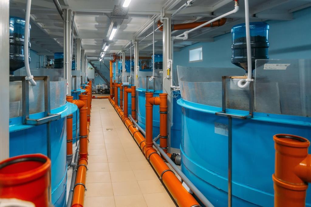 Indoor aquaculture tanks with water treatment and biosecurity systems, showcasing hatchery and farm management technology at AquaME AgraME 2025 Dubai.