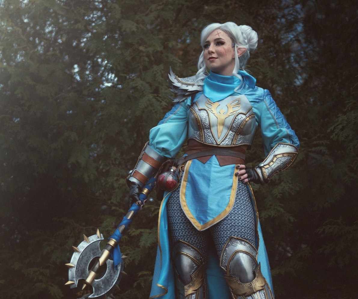 CheesecakePanda wearing a blue outfit with grey armour