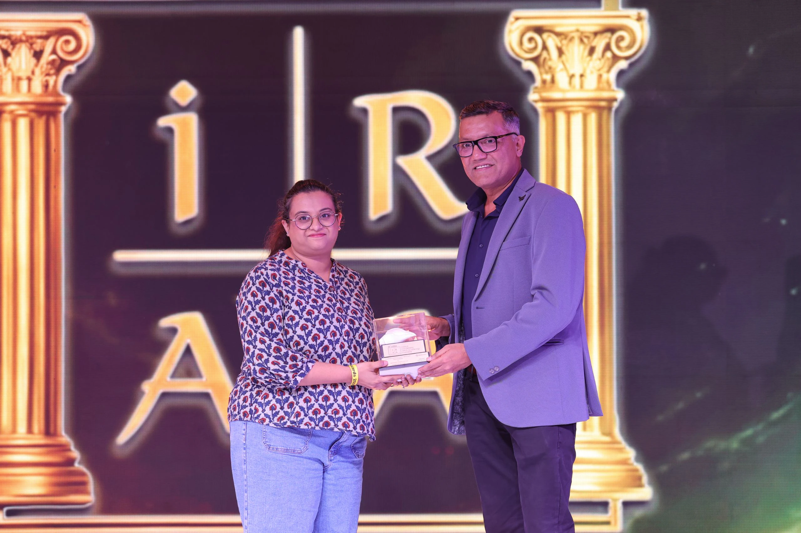 IRAA 2026 - Ishwari Tamhan collects the award on behalf of Justin Jose & Omkar Tamhan for Mariyano Studios for Studio of the Year