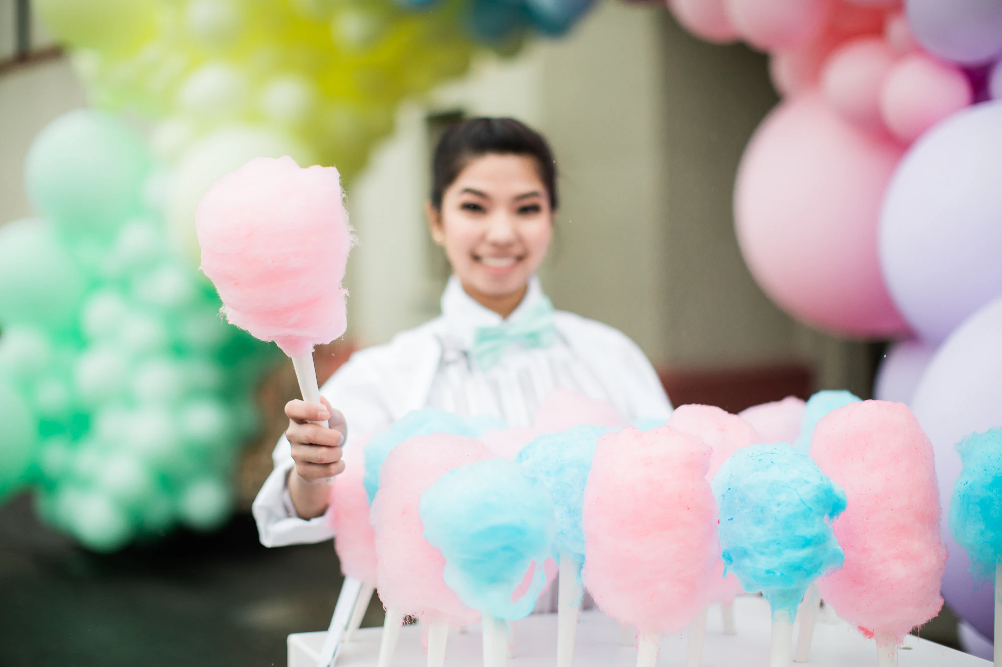 smiling cotton candy vendor