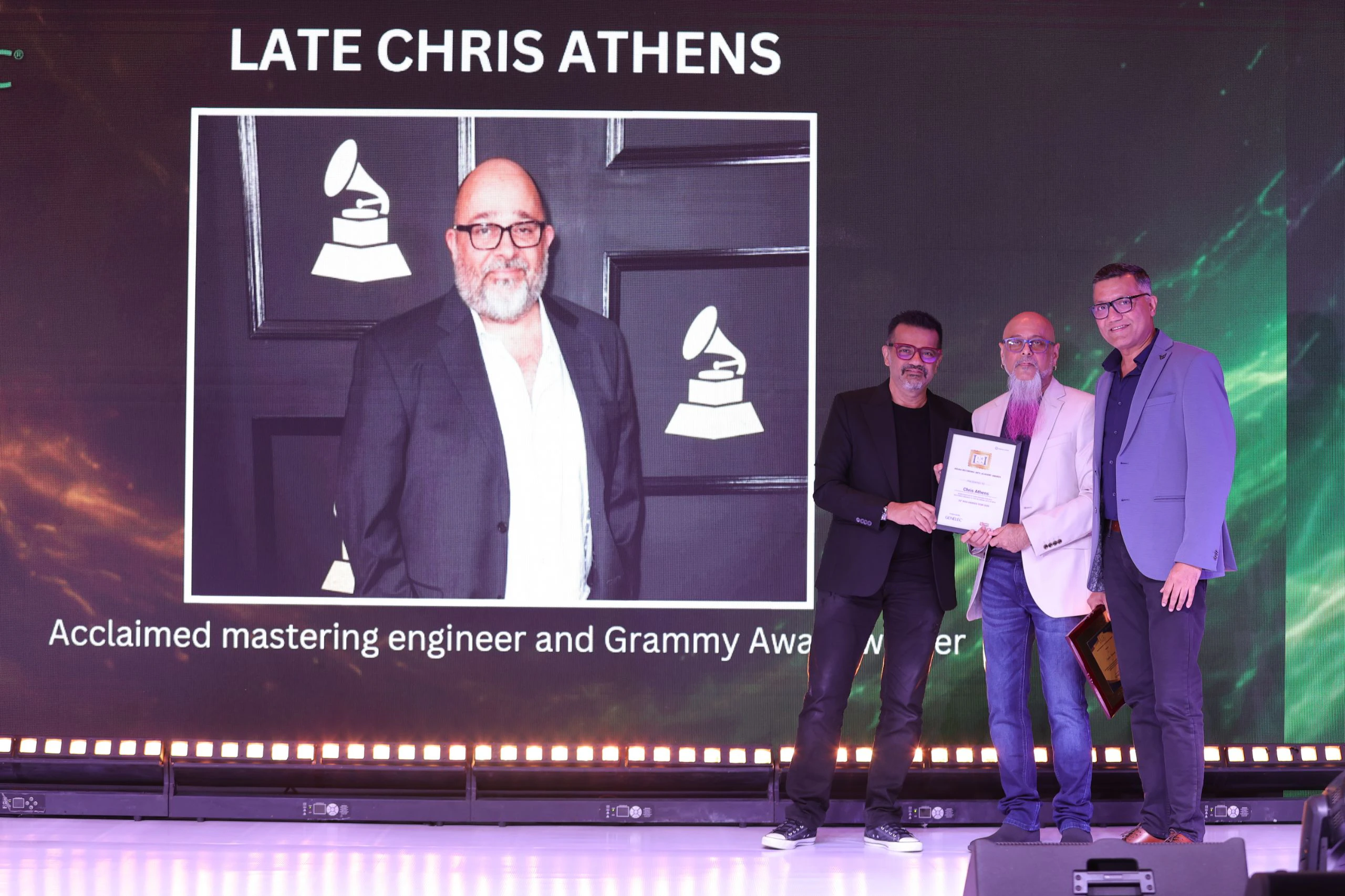 Shantanu Hudlikar receives a special memento for Chris Athens