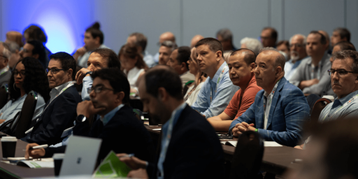Visitors Listening at Conference