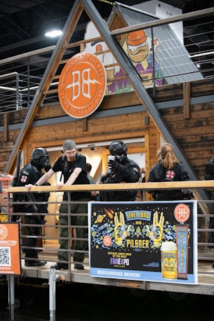 The defenders of Raccoon City (Silent Hill) enjoy a pint at the Breckenridge Brewery booth.