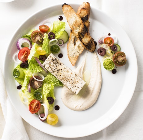 plate with salad and roasted chicken