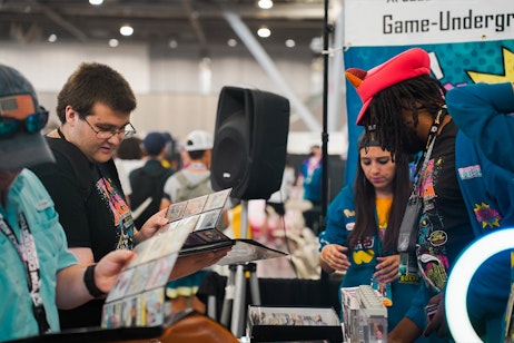 a fan looking at trading card binders