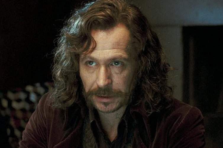 Sirius Black looking seriously at someone near him