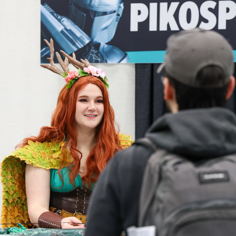 Cosplay guest greeting fan