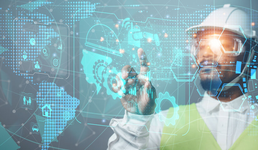 Man in construction hard hat and vest pressing a virtual screen