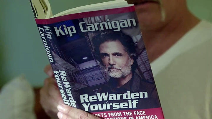 Book with Chris Sarandon's face on it in front of prison cells. The Caption is: Kip Carnigan. Rewarden yourself.