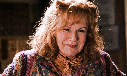 Molly Weasley smiling happily at someone