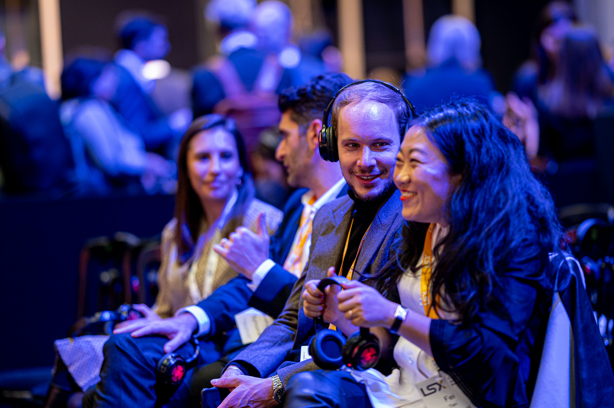 LSX conference audience members enjoy a private joke