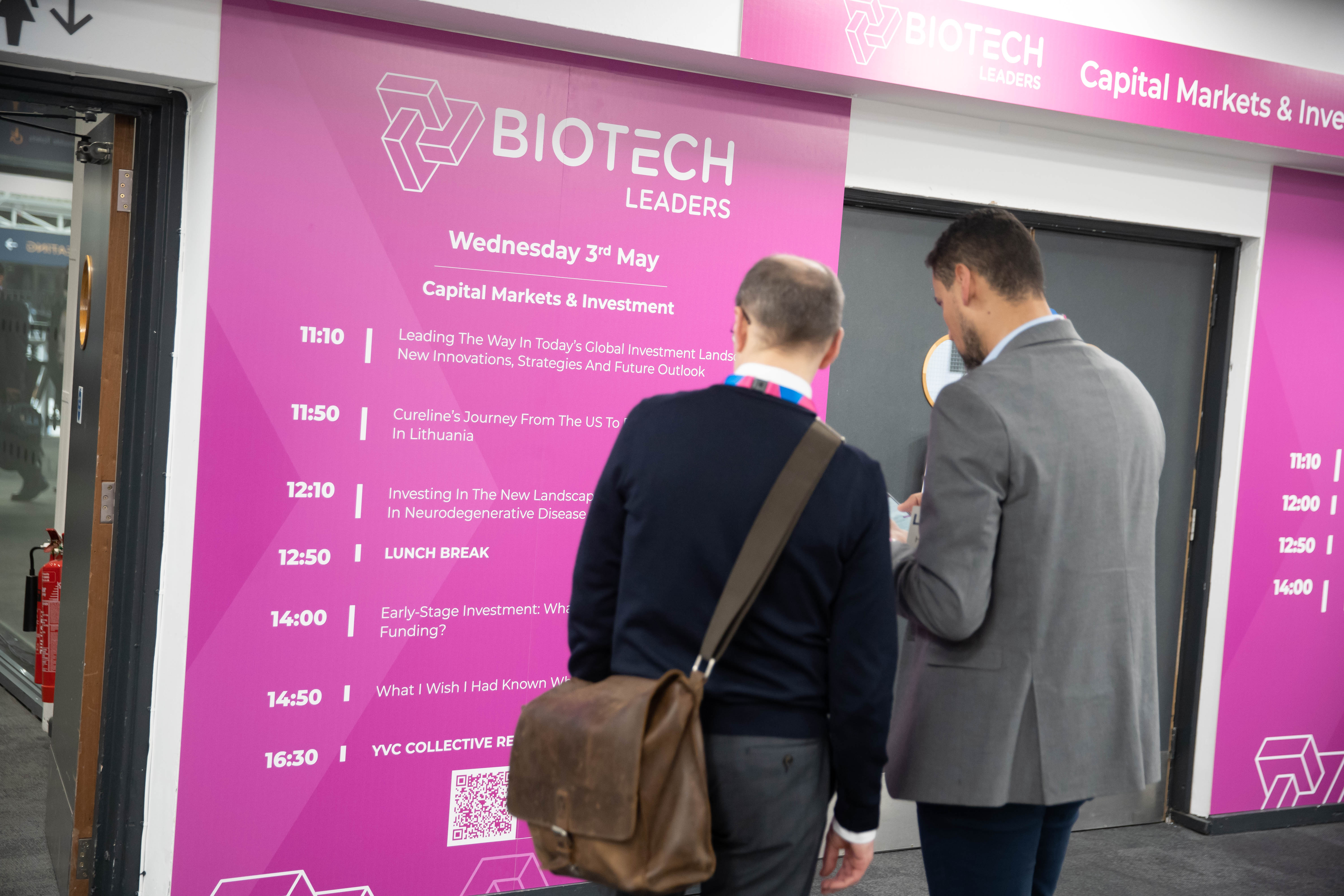 Biotech leaders attendees check the agenda