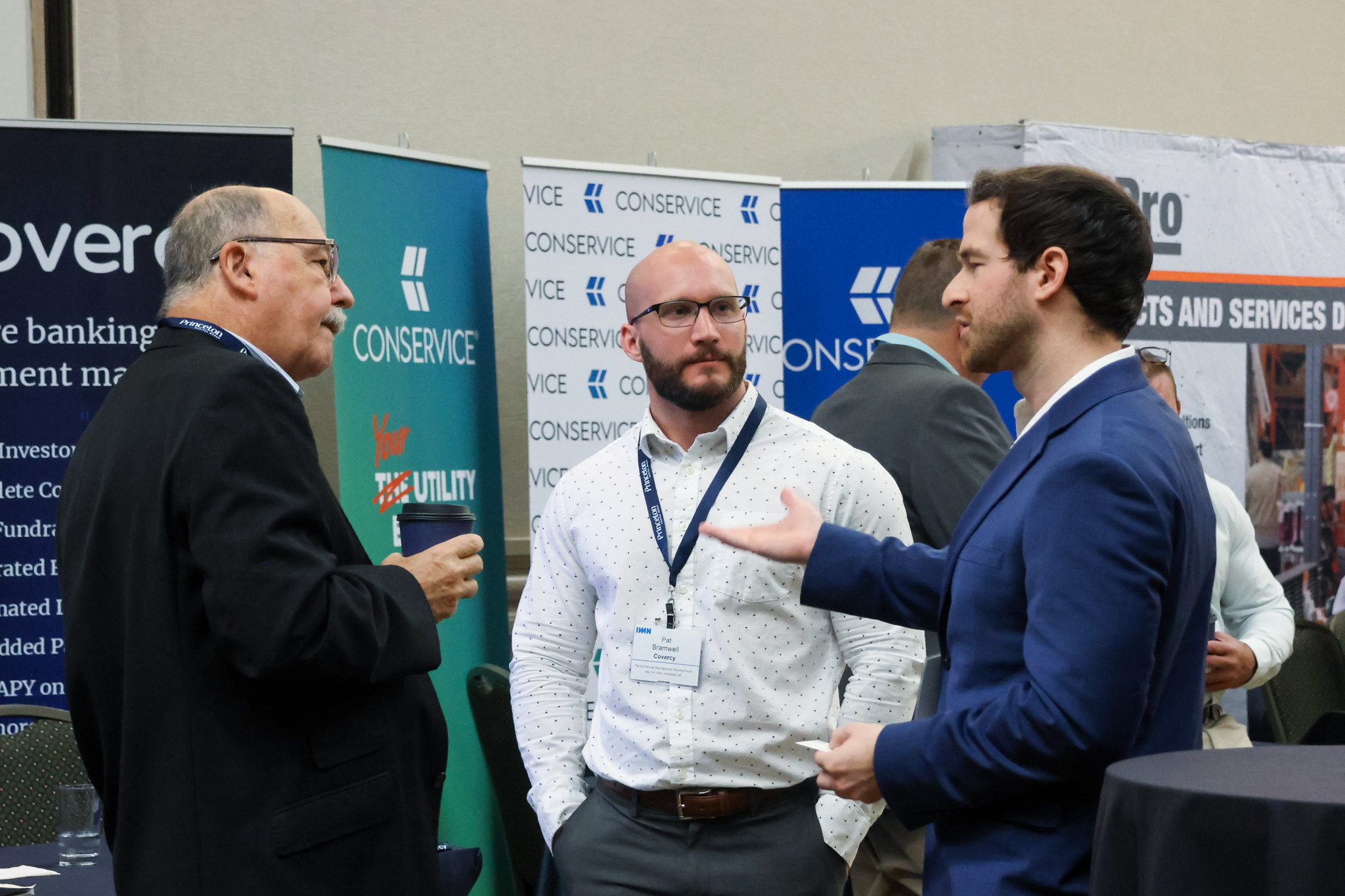 People talking at Manufactured Housing (West) Event