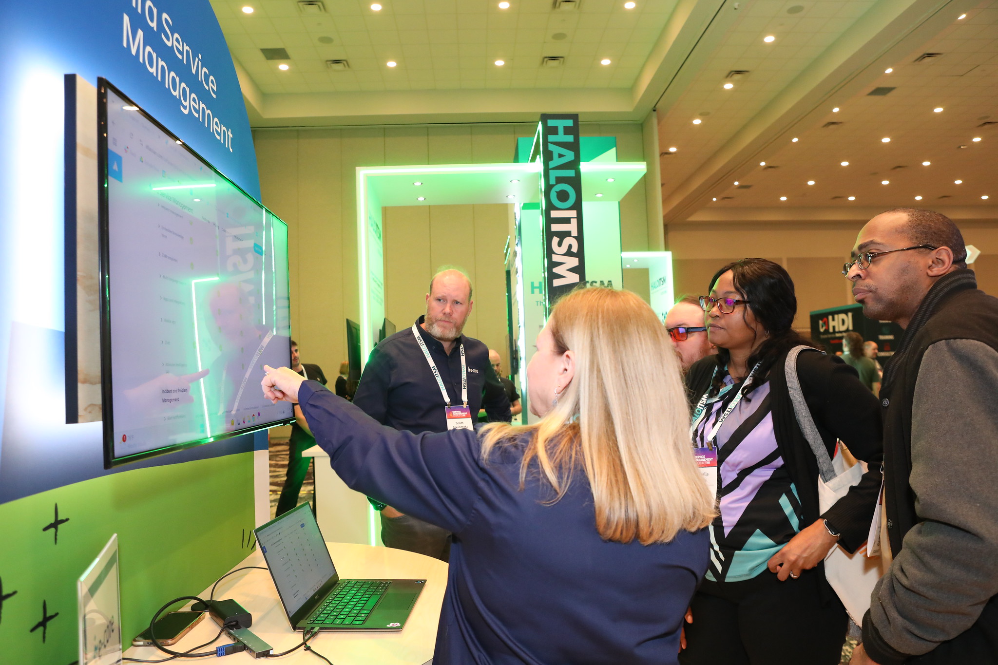 Attendees at Exhibitor Booth